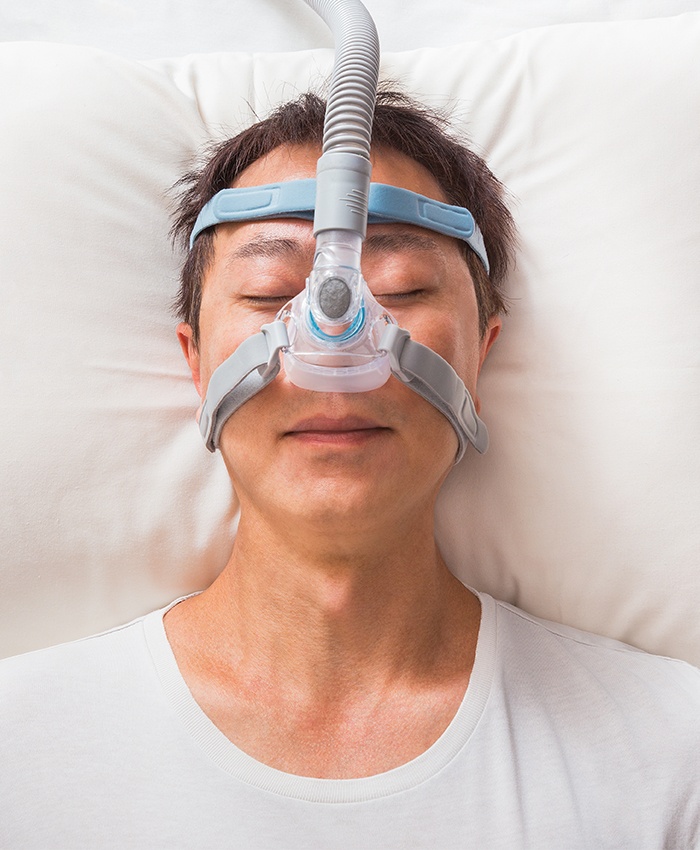 Patient with C PAP mask sleeping