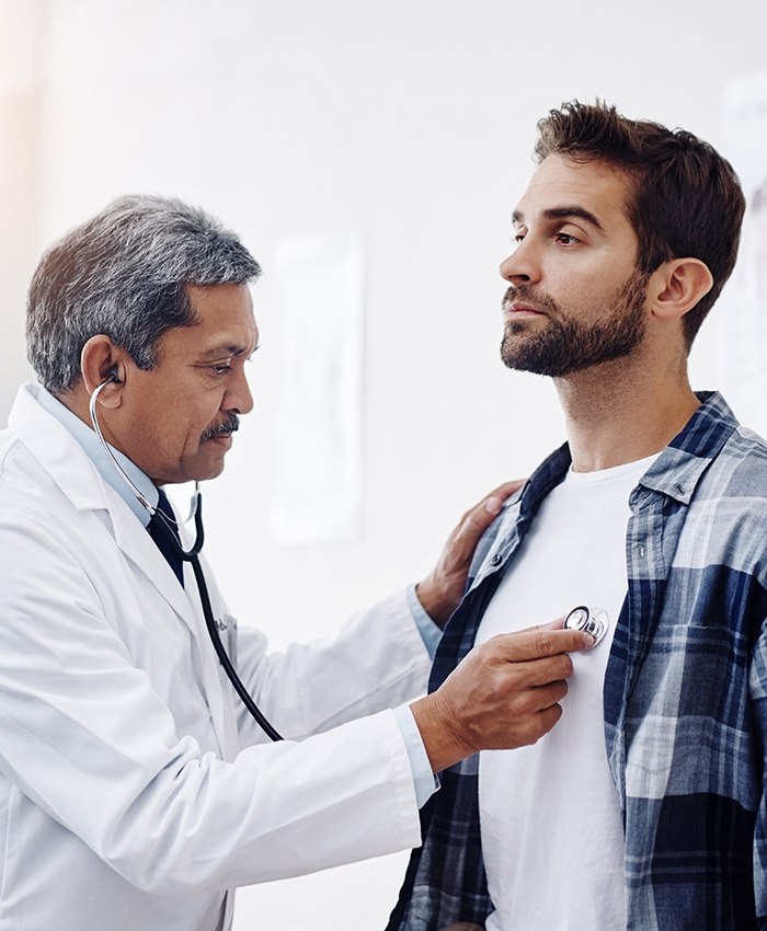 Man visiting his doctor for routine physical